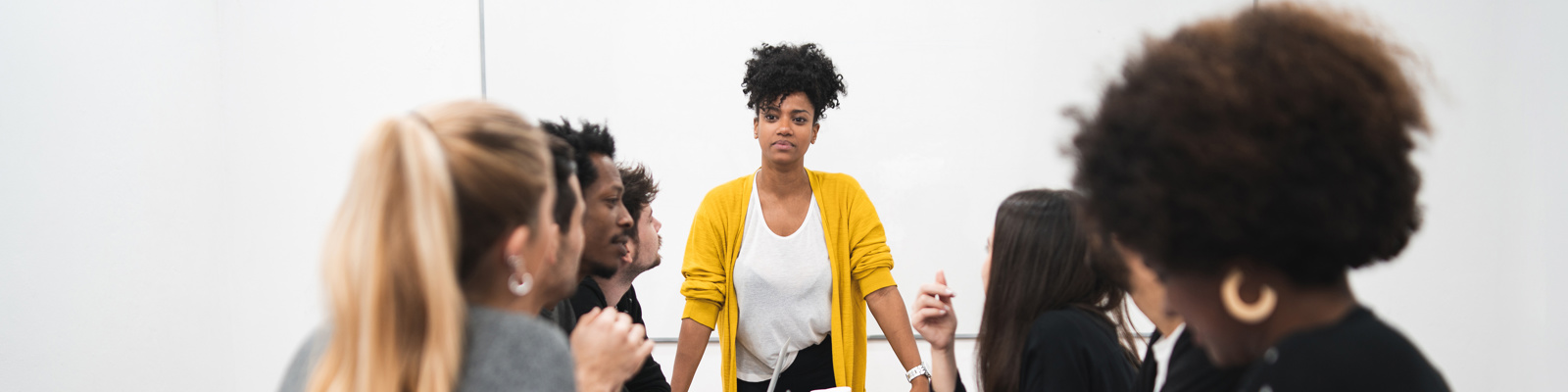 Manager woman leading a brainstorming meeting