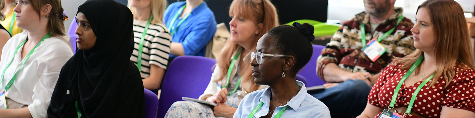 Photo of a group of delegates sat in a session at fundraising convention 2025