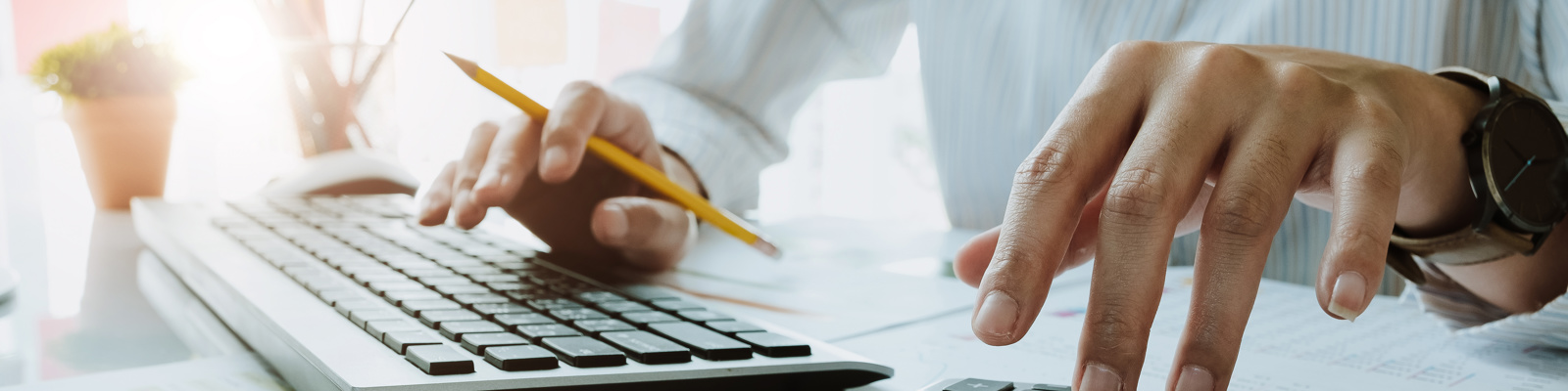 Bookkeeper or financial accountant hands making report, calculating.